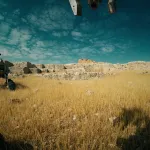 krajobraz z trawy koamienia i nieba